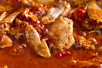 Stewed chicken in tomato sauce