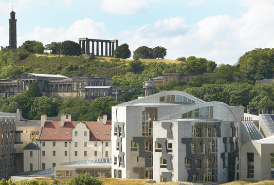 Edinburgh city view with Parliament and Regent Garden. Scotland.