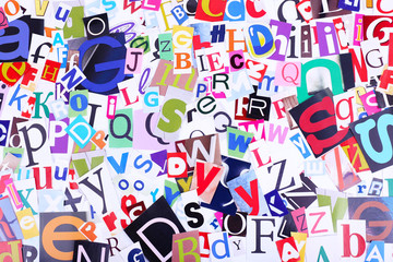 Colorful newspaper letters as background