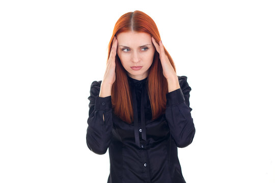 Redhead woman with a strong headache
