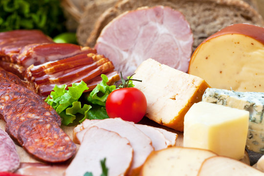 Variety of meat products and cheese