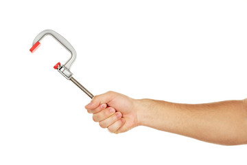 Clamp tool in male hand isolated on white