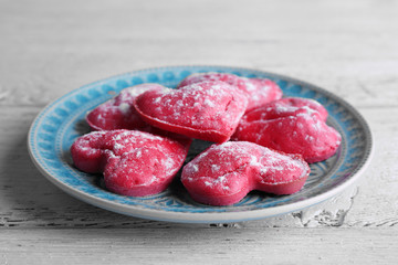 Cookies in form of heart in plate