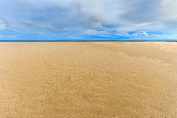 Fototapeta na wymiar Empty sand beach for backgrounds.