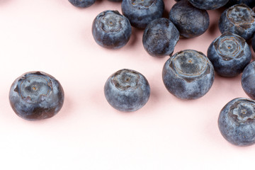 Blueberries over pink