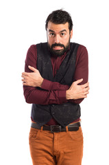 Man wearing waistcoat freezing over white