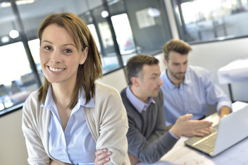 Fototapeta premium Portrait of businesswoman attending meeting
