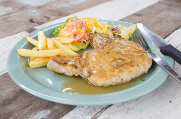 Grill pork steak