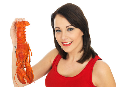 Young Woman Holding a Cooked Lobster