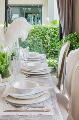 table set in white dinning room
