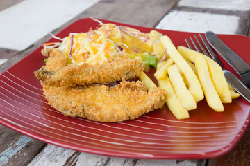 Fish steak with vegetables