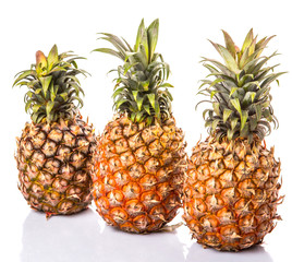 Pineapple fruit over white background