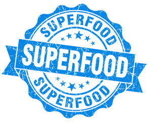 Obraz premium superfood blue grunge seal isolated on white