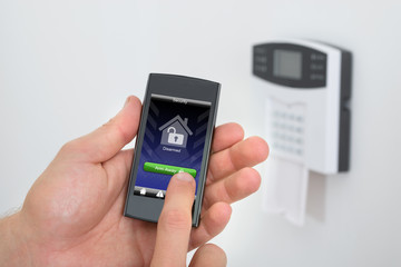 Security Alarm Keypad With Person Arming The System