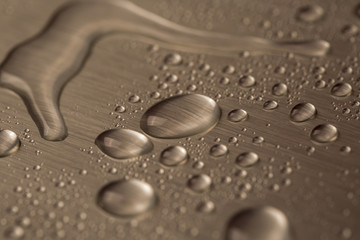 Drops of water on blue background