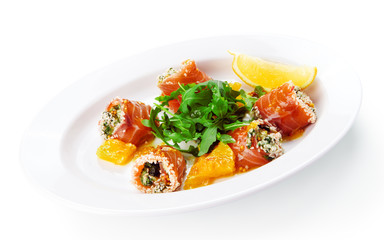 Restaurant food isolated - smoked salmon rolls with arugula
