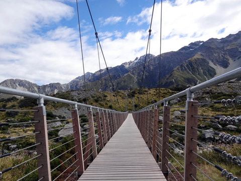 Suspension Bridge over Glacial River