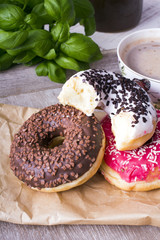 coffee and donut on wood background