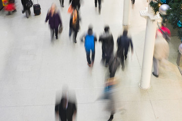 London Train Tube station Blur people movement in rush hour, at
