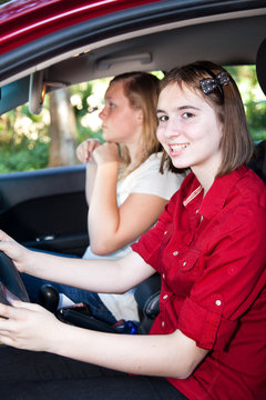 Teenage Girls Driving a Car