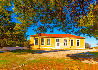 Fototapeta na wymiar the old school of Pigadi village in southern Greece