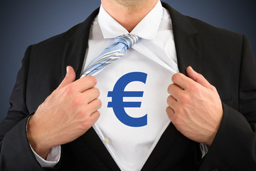 Businessman Showing Euro Sign On His Chest