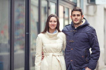 Portrait of young couple on the street