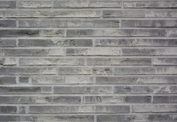 Modern wall in brick-pattern style