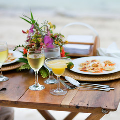 Romantic dinner served for two on a beach