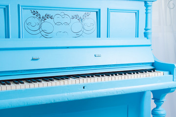 Colorful blue upright piano © kolotype