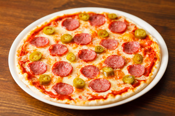 pizza on wood background