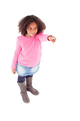Adorable african little girl indicating something with her finge