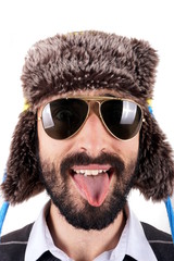 Man with winter hat and sunglasses