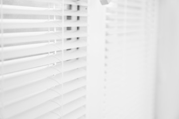 White window with opened blinds