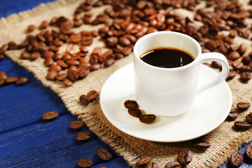 Cup of coffee on wooden table
