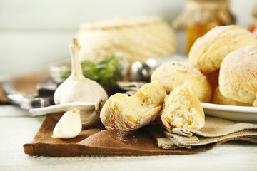 Fresh homemade bread buns from yeast dough with fresh garlic