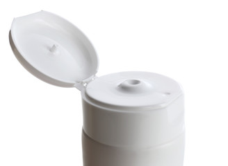 Open cosmetic bottle isolated on white