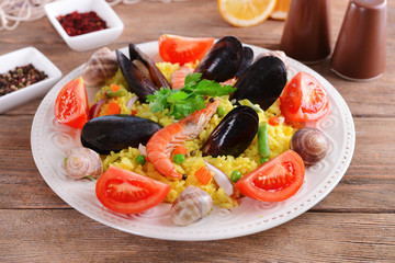 Seafood Paella on plate on table close-up