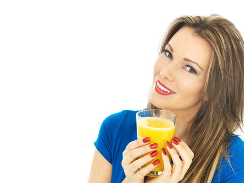 Young Woman Drinking Orange Juice