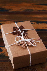 Christmas gift box with handmade brown crochet snowflakes
