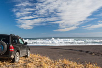 Black crossover on the coast of Pacific Ocean.