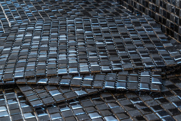 Fototapeta premium Black mosaic tiles