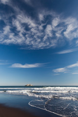 The Pacific coast. Black sand. Kamchatka.