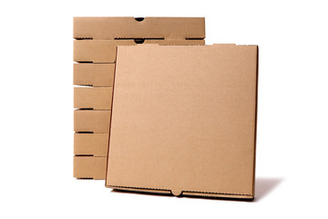Stack of brown pizza boxes with display box front facing isolated photo