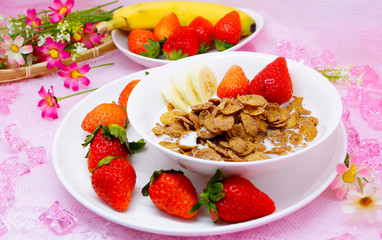 Delicious healthy breakfast cornflakes with strawberry and banan