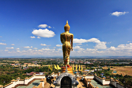 Buddha Statue facing the town on the top of mountain
