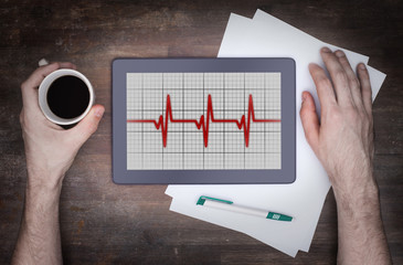 Electrocardiogram on a tablet - Concept of healthcare