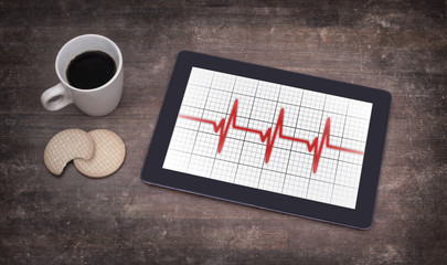 Electrocardiogram on a tablet - Concept of healthcare