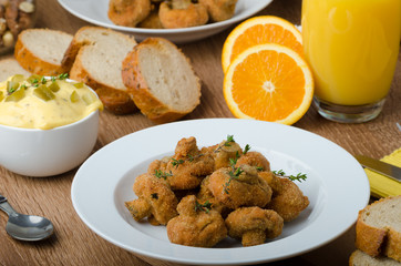 Breaded fried mushrooms with juice