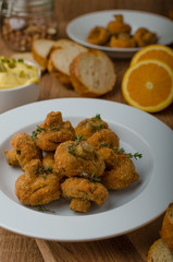 Breaded fried mushrooms with juice